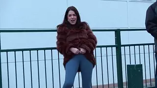 Horny slut pees through her pants in public